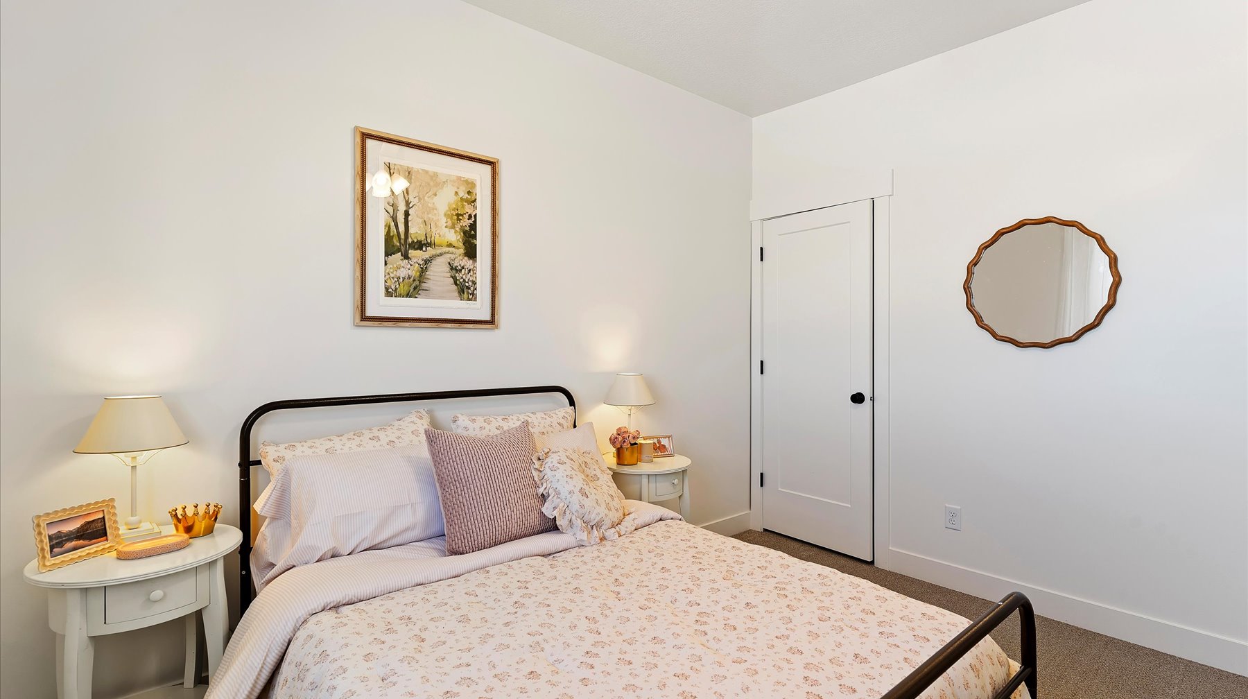 Bedroom featuring carpet floors and baseboards