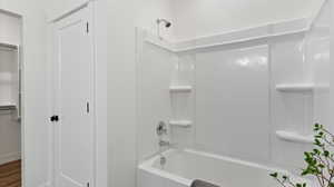 Full bathroom with bathing tub / shower combination