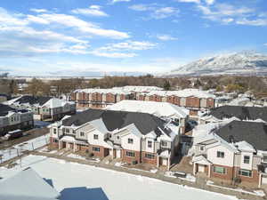 Snowy aerial view with a residential view