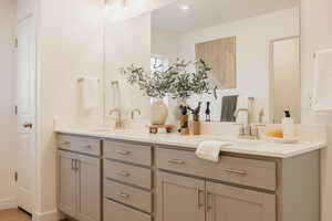 Bathroom featuring double vanity