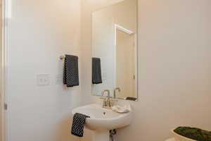 Half bath featuring toilet