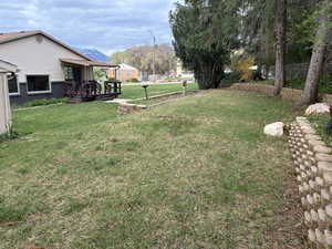 The backyard has two flat levels, a greaat place for large gatherings, or just spending time outdoors.