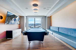 Playroom featuring pool table and wood finished floors