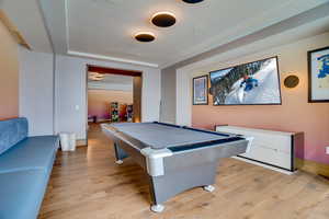 Game room featuring pool table and light wood finished floors