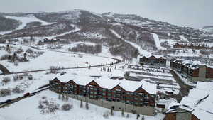 Snowy aerial view with a mountain view