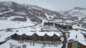 Snowy aerial view with a mountain view