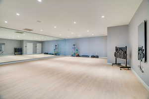 Workout room with recessed lighting