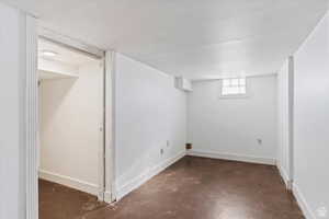 Basement featuring baseboards