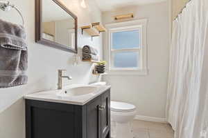 Bathroom with vanity and a shower with curtain