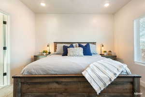 Carpeted bedroom featuring recessed lighting