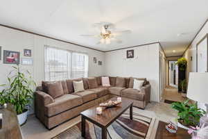 Living area with a ceiling fan