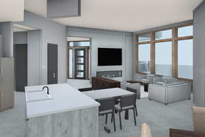 Dining area featuring healthy amount of natural light and light carpet