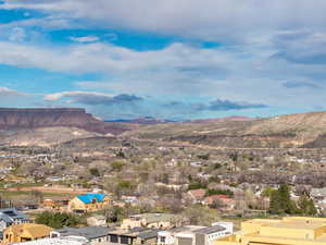 View of mountain background featuring nearby suburban area