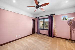 Spare room featuring ceiling fan, light colored carpet, and recessed lighting