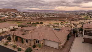 Aerial view of residential area featuring mountains