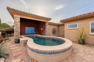 Swimming pool featuring a patio area