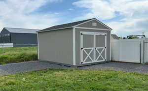 Large Storage shed in back corner of property