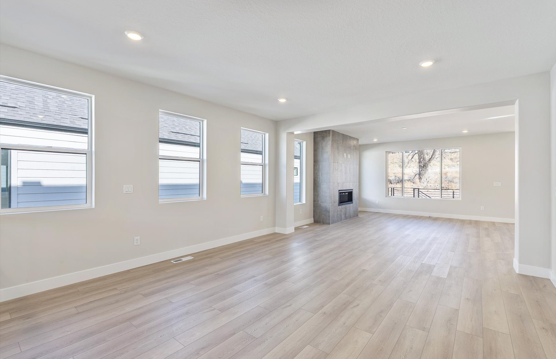 Flex room and Gathering Room featuring a tile fireplace