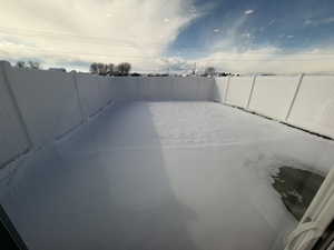 View of fenced backyard