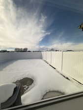View of fenced backyard
