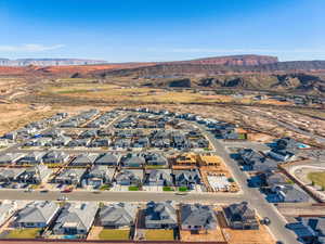 Aerial view of residential area featuring mountains