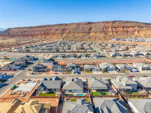 Aerial view of residential area with a mountainous background