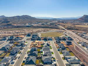 Aerial view of residential area featuring a mountain backdrop