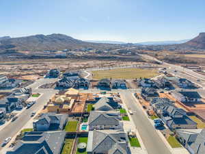 Aerial view of residential area with a mountain backdrop