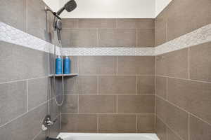 Full bathroom with washtub / shower combination