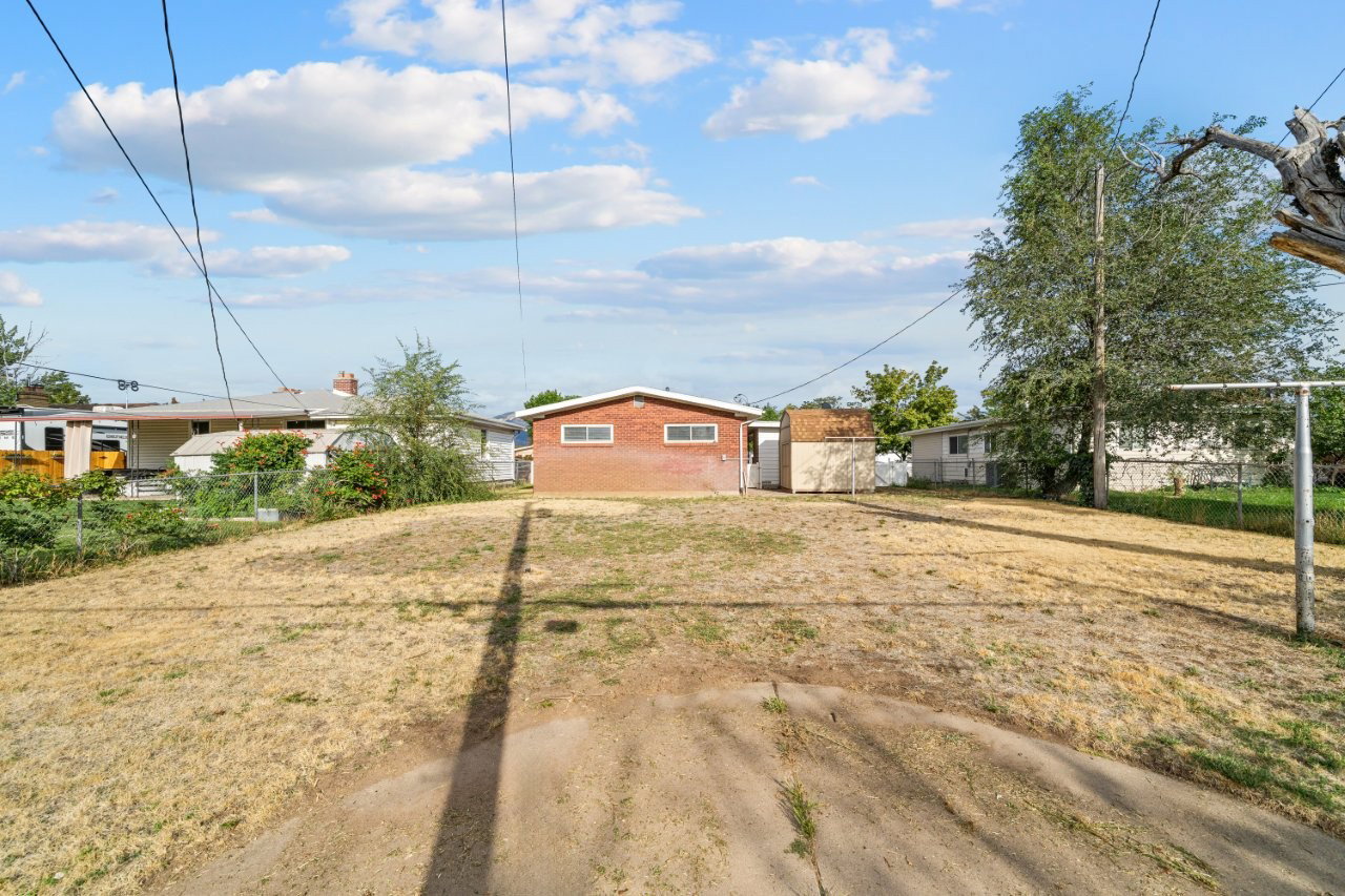 The backyard is fully fenced