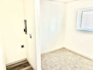 Laundry area featuring washer hookup and electric dryer hookup