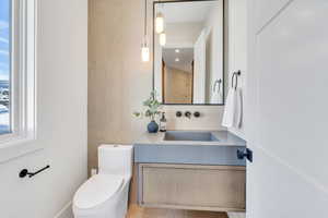 Bathroom with toilet and vanity