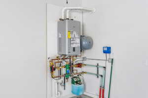 Utilities with tankless water heater