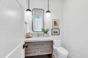 Bathroom with toilet and vanity