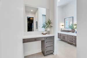 Bathroom featuring vanity and recessed lighting