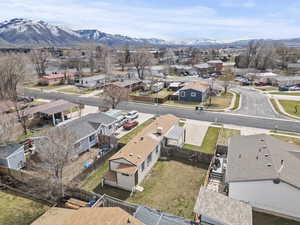 Aerial view of residential area with a mountain backdrop