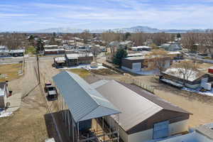 Aerial view of residential area with a mountainous background