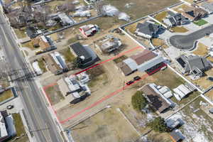 Aerial perspective of suburban area featuring property parcel outlined