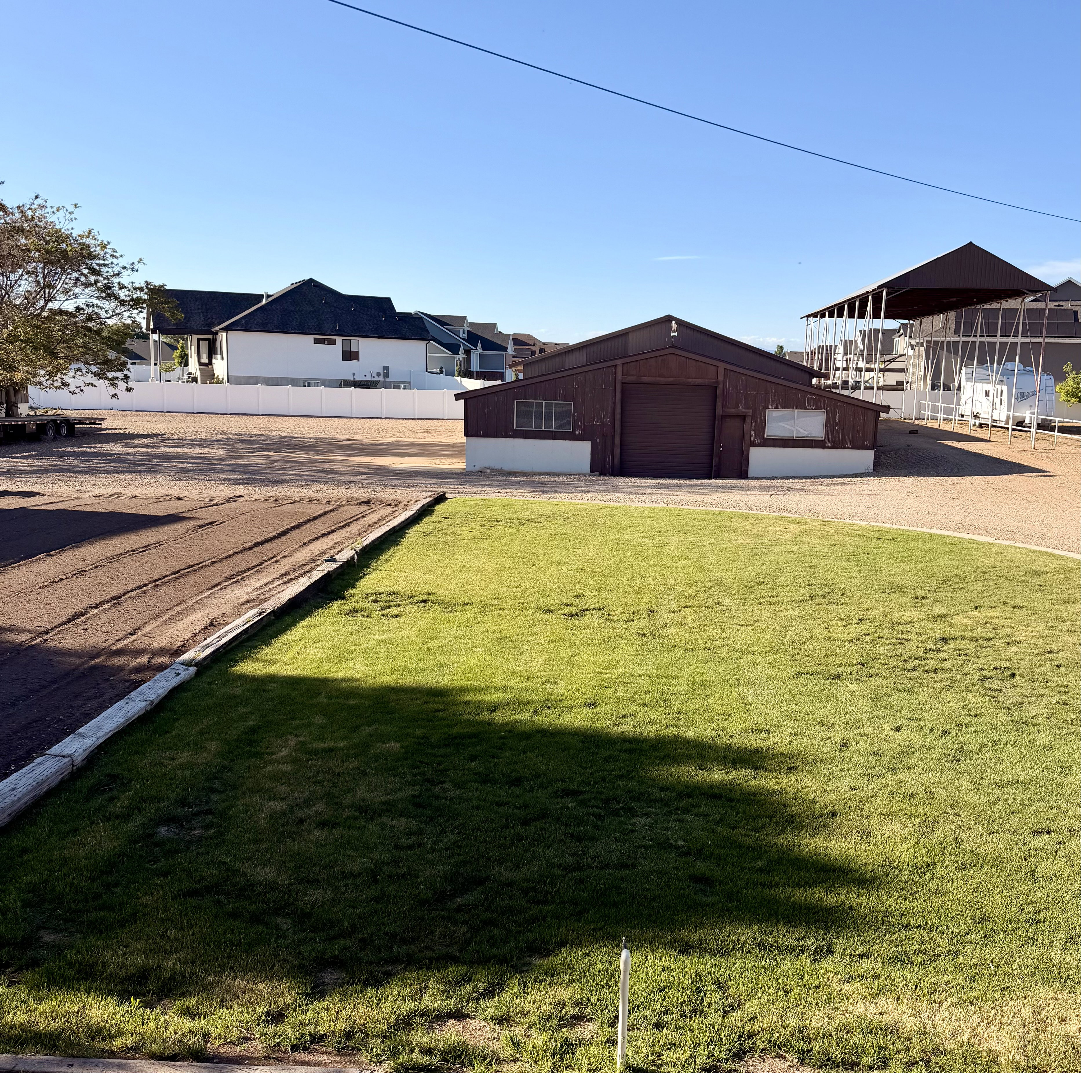 Expansive green lawn area with manicured grass