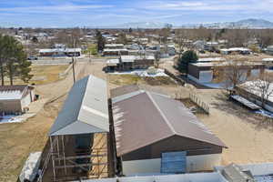 Aerial view of residential area featuring a mountain backdrop