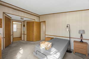 Primary bedroom with two walk in closets