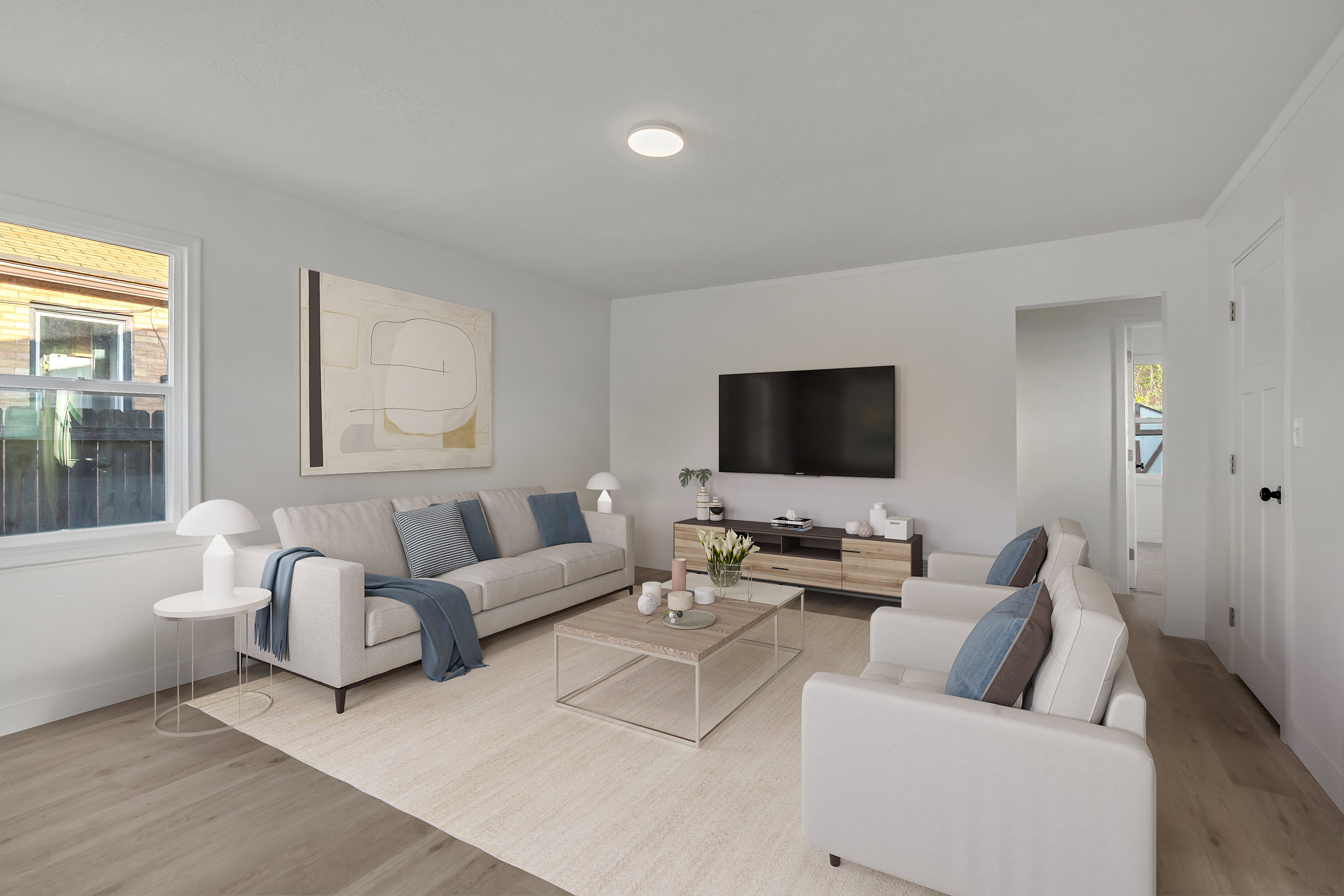 Living area featuring wood finished floors and baseboards