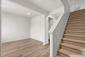 **DISLCAIMER** Interior package & colors may vary. Stairs with wood finished floors and recessed lighting