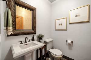 Bathroom with toilet and a sink