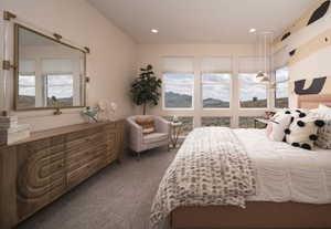 Bedroom with multiple windows, dark colored carpet, a mountain view, and recessed lighting