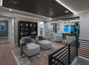 Sitting room featuring wood-type flooring