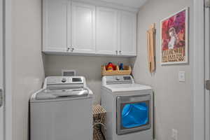 Laundry area with generous cabinet space