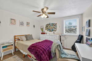 Basement apartment bedroom with ceiling fan