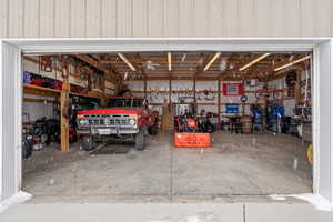 Massive 43'x30' Detached Garage/Shop. Mezzanine Storage. Tall ceilings. Man Cave. Small business shop. Large overhead door.