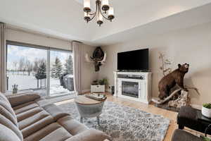 Main Level Living! High Quality 3/4" Hard wood flooring throughout main areas. Vaulted Ceilings. Can lights. Generous slider for abundant natural light.